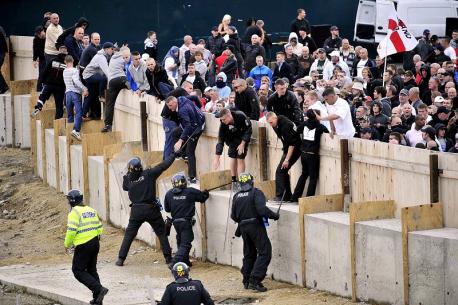 Protesters and police clash during the English Defence League protest in Bradford city centre 