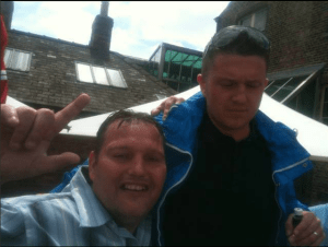 Moorhouse posing with Tommy Robinson