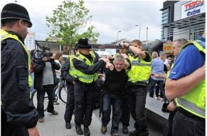 John Claydon is arrested after the assault during the EDL march in Hull.