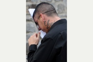 Stefan Adamson, wearing a David Cameron mask, attending a previous court hearing