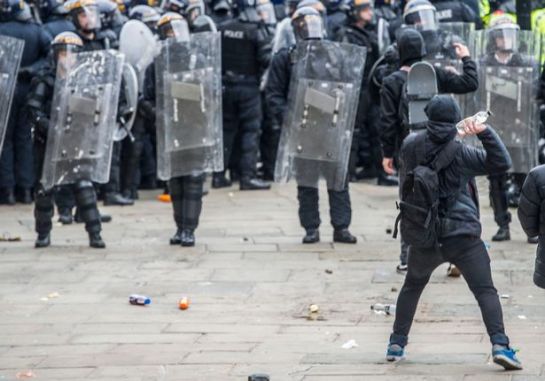 Liverpool's Lime Street was brought to a standstill during a full-scale riot erupted after anti-racist confronted around 70 people from far-right group the North West Infidels. Photo by James Maloney