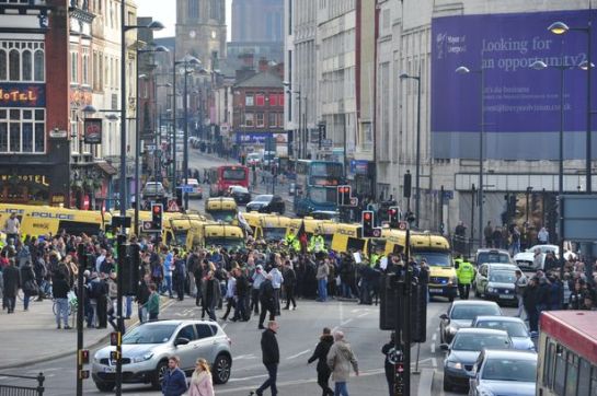 Liverpool's Lime Street was brought to a standstill during a full-scale riot erupted after anti-racist confronted around 70 people from far-right group the North West Infidels. Photo by James Maloney