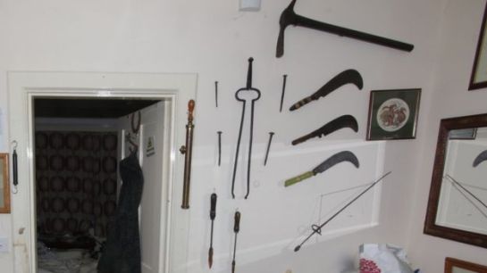 Bracher's house was "full of weaponry" including machetes and knives 