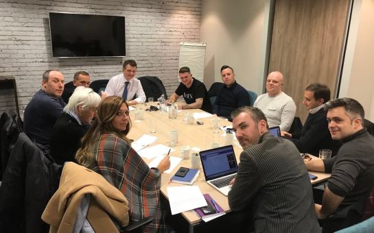  Gerard Batten, in the white shirt and blue tie, sitting to the left of Tommy Robinson, with Daniel Thomas to his right, at the Ukip demo planning meeting Credit: Gerard Batten/Twitter 