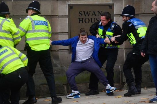 David Davis being arrested at the demo in 2017